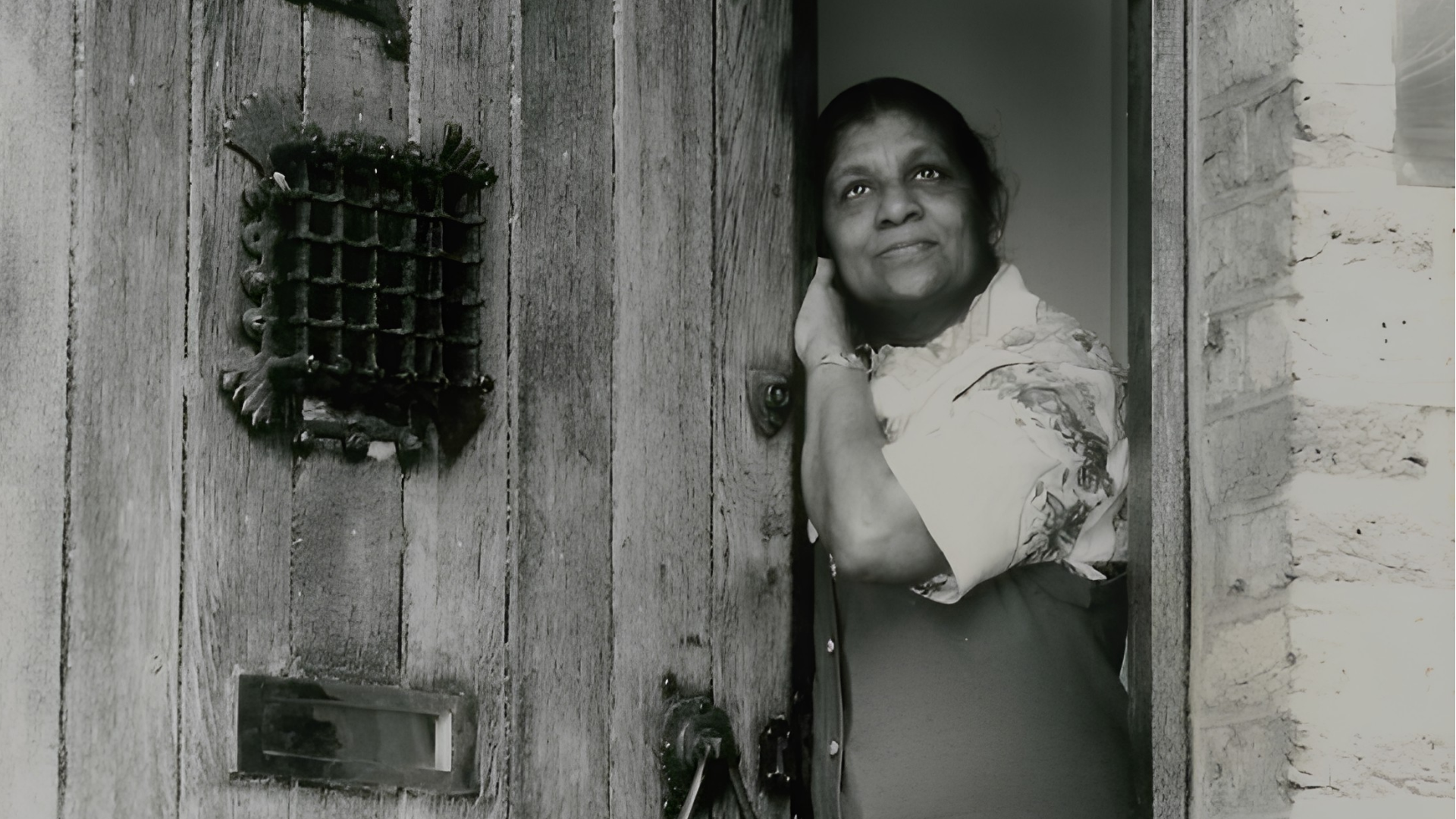Black and white photo of migrant domestic worker.